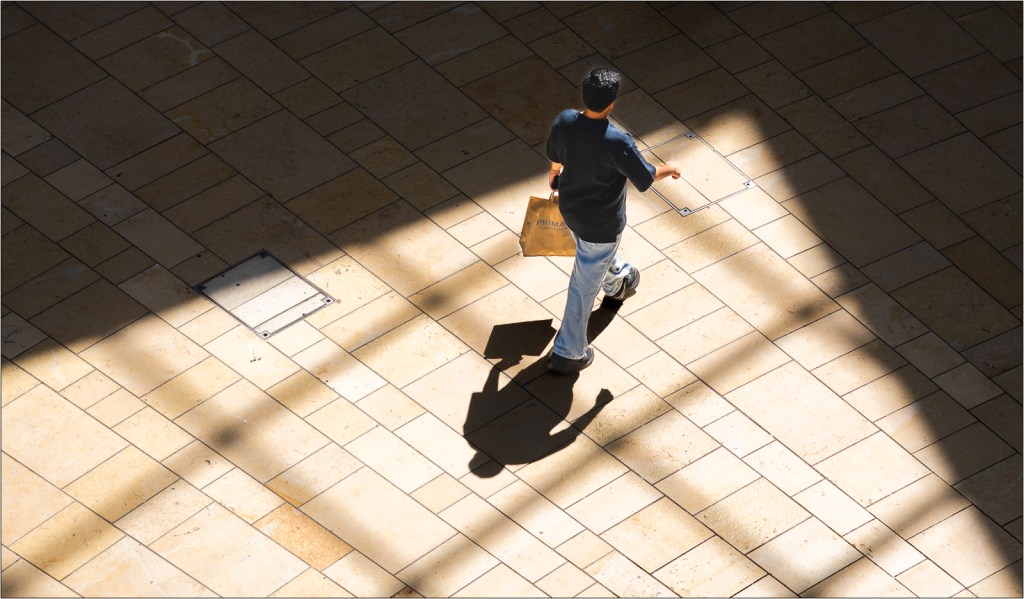shadows of people in cabot circus bristol